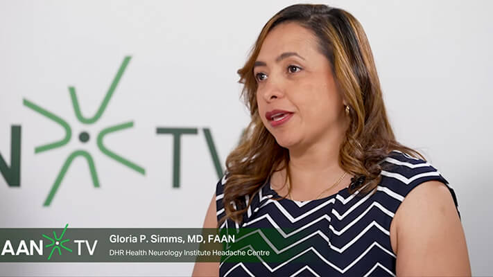 AANTV broadcast of physician with AAN logo background and a banner