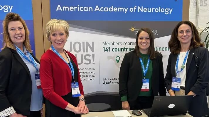 Dr. Carlayne Jackson, President, ɫ, Mary Post, CEO, ɫ, and  AAN Staff in the Neurohood at the EAN Conference