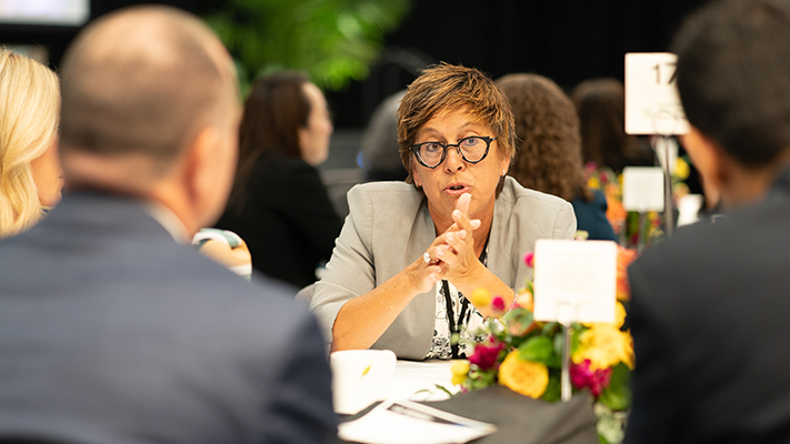 AAN Brain Health Summit attendee Diana Slowiejko, PharmD, PhD, participates in small breakout group discussion