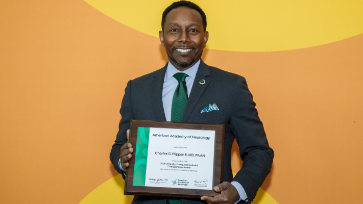 Charles C. Flippen II, MD, FAAN, after receiving the AAN Changemaker Award.