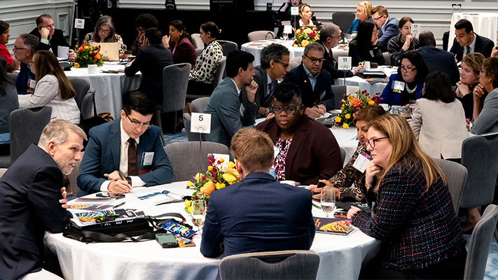 Brain Health Summit attendees participate in small breakout group discussions