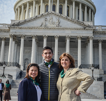 Aileen A. Antonio, MD with two other neurologists in front of the D.C. capitol building